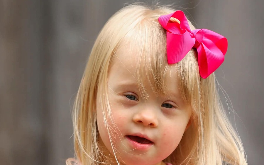 A child supported by USMIO community programs